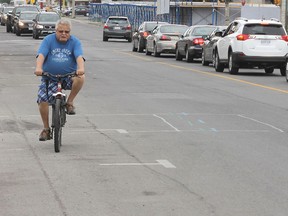 Plans to rebuild Princess Street in the Williamsville neighbourhood include adding bike lanes at the expense of parking spots.     (ELLIOT FERGUSON - QMI AGENCY)