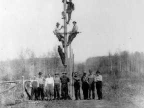 Workers pose for a photo with a telephone pole in Clover Bar — located northwest of what is now Ardrossan —  on May 25, 1913. Photo Courtesy Strathcona County Museum and Archives