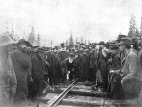 Lord Strathcona, a financial backer of Canadian Pacific Railway’s transcontinental railroad, drives in the final spike for the project’s construction during a ceremony held at Craigellachie, B.C. on Nov. 7, 1885. The railroad was the first to link Eastern Canada to the Pacific Coast. Photo Courtesy of Canadian Pacific Archives