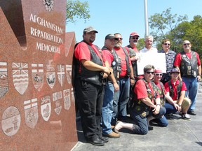 ERNST KUGLIN QMI Agency
The Juno Unit of the Canadian Army Veterans Motorcycle Club donated $1,000 to the Afghan Repatriation Memorial fund. Clubs members Pavel Mokros, Andrew Whynott, Christine Whynott, Nicholas Whynott, Andre Mrozewski, Bernadette Mrozewski, Nathan Ross and Justin Bernard presented the cheque to Quinte West Mayor John Williams and Hugh O'Neil Monday.