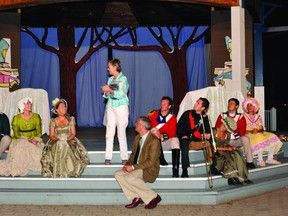 St. Lawrence Shakespeare Festival Chairman Jo-Anne Beckstead congratulates cast members and artistic director Ian Farthing, seated centre, following the weekend's season finale at Prescott's amphitheatre. (NICK GARDINER The Recorder and Times)