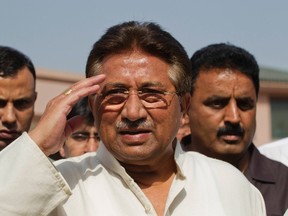 Pakistan's former President and head of the All Pakistan Muslim League (APML) political party Pervez Musharraf salutes as he arrives to unveil his party manifesto for the forthcoming general election at his residence in Islamabad in this April 15, 2013 file photo. (REUTERS/Mian Khursheed)