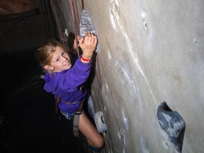 Bridget Shea climbs a route at the Boiler Room Climbing Gym as part of their 'Walls and Waves' camp with the City of Kingston. 
Sam Koebrich for The Whig-Standard