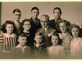 Theuna and Bastiaan Groeneweg are surrounded by their children, in a 1951 photograph. The family emigrated 60 years ago this month to Canada and St. Thomas. Front row: John, left, Dick and Nellie. Middle row: Eva, Theuna and Bastiaan, Cobie and Corrie. Back row: Bas, Max and Peter.