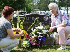 Betty Mercer (right) and her daughter Judy Peppler visited the Tillsonburg Cemetery Sunday afternoon for the annual Decoration Day. CHRIS ABBOTT/TILLSONBURG NEWS