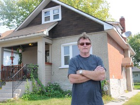 Mark Turner stands in front of one of his many rental properties. Turner and a handful of other landlords are lobbying for policy changes when it comes to renting to individuals on ODSP and Ontario Works. 
W. BRICE MCVICAR The Intelligencer