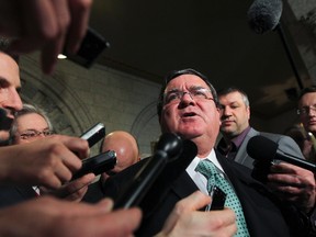 Finance Minister Jim Flaherty speaks to the media at Parliament Hill in Ottawa April 29, 2013.  Flaherty spoke about the Economic Action Plan. (Andre Forget/QMI Agency)