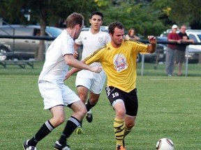 Wallaceburg Sting's Phil Nywening dribbles the ball in a Western Ontario Soccer League Premier League game, played Tuesday night at Wallaceburg's Kinsmen Park against Sarnia. The game ended in a 1-1 tie. Taylor McArthur had the Sting goal.