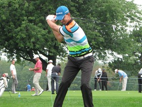 Michael Gligic of Burlington, Ont., tees off on the first hole at The Great Waterway Classic on Thursday. Most of the first round of the classic, being held at Upper Canada Golf Course in Morrisburg, was washed out due to rain. The tournament continues today and ends on Sunday.
(Todd Hambleton QMI Agency)