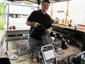 Gabriel Holley, 15, is a young entrepreneur with The Summer Company. Holley's business venture, "City-Wide Scrappers," collects scrap metal materials from customers who want to dispose of them. LIZ BERNIER/THE OBSERVER/QMI AGENCY