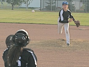 Ashley James, shown here warming up prior to throwing an inning for Team Alberta in an exhibition game against the Spruce Grove peewee Triple A White Sox brings two very different pitches, plus sidearm action, to the mound and that, her skipper says, should prove to be a benefit for Team Alberta at the national championships this week. - Gord Montgomery, Reporter/Examiner