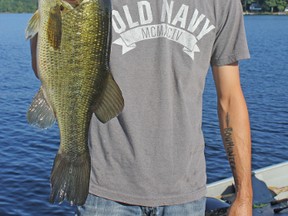 Sam Rose weighs in a 4.74 pound largemouth bass, which landed him third place on Sharbot Lake in the Land O' Lakes Fishing Tournament.
Ashley Rae