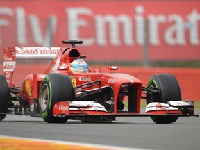 Ferrari's Spanish driver Fernando Alonso drives during the qualifying session at the Spa-Francorchamps circuit in Spa yesterday. He will start ninth and was frustrated afterward. (AFP)