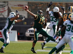 Eskimos quarterback Mike Reilly lets the ball sail (Ian Kucerak, Edmonton Sun).