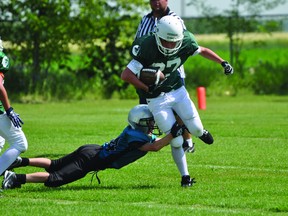 Action from the Portage Pitbulls/Eastman Raiders peewee game Aug. 25. (Kevin Hirschfield/THE GRAPHIC/QMI AGENCY)