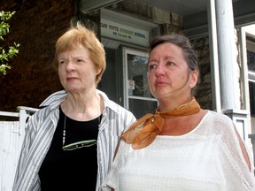 Margaret Bly, left, chair of the board of directors for the Helen Tufts Nursery School, and Sue Collins-Nixon, director of the school, stand in front of the Johnson Street facility. The nursery, which was founded in 1966 by Mary Straw. (Ian MacAlpine The Whig-Standard)