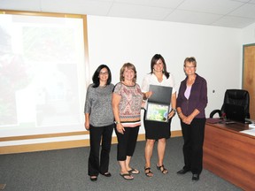 From left: Tammy Porter, outreach support worker, Darlene Johnson, shelter supervisor, Becky Wells, executive director of the Wellspring Family Resource & Crisis Centre along with Helen Schutte of the Communities in Bloom committee. The Wellspring Family Resource & Crisis Centre was awarded the prize for the Communities in Bloom non-profit category at an awards ceremony and dinner on Tuesday, Aug. 20 at the Forest Interpretive Centre.
Barry Kerton | Whitecourt Star