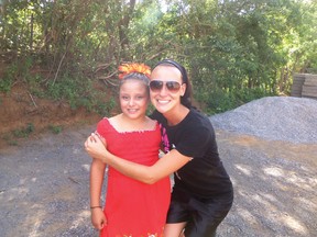 Destinee Shepherd (right) sharing a moment with one of the students who will be attending the new school she helped build in Nicaragua.