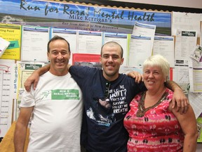 Mike, Jacob and Kathy Kerrigan, of Glencoe, share a laugh prior to the third leg of the Run 4 Rural Mental Health. Mike recently completed the 1,800km journey from Strathroy to Miramichi, New Brunswick in support of Search Community Mental Health Services and to raise awareness for mental illness in general in late September.
File Photo
JACOB ROBINSON/AGE DISPATCH/QMI AGENCY