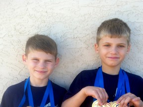 yder Patten (left) and his big brother Nathaniel had some major wins recently the Alberta Summer Swimming Association (ASSA) provincials in Edmonton. Ryder won a gold medal in the 25 metre backstroke and gold in the 50 metre backstroke, while Nathaniel took home gold in 100 metre individual medley and 50 metre butterfly as well as bronze in the 25 metre butterfly and 50 metre backstroke.