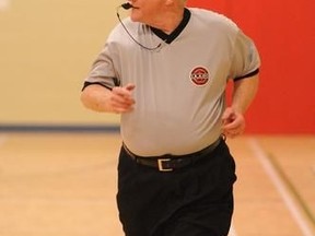 Greater Sudbury Board of Basketball Officials Association president Charlie Ketter heads down the court with a watchful eye in this 2010 photo. Ketter has put out a call for more young officials. GINO DONATO/SUDBURY STAR