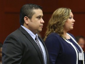 George Zimmerman, with his wife Shellie, arrives in Seminole circuit court on the opening day of his trial in Sanford, Florida, June 24, 2013. (REUTERS/Joe Burbank/Pool)