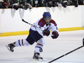 Strathroy Rockets forward Shawn Grogan backhands a puck into the offensive zone during GOJHL exhibition action at the Gemini Sportsplex August 27. The Rockets won their final tune-up contest of the summer 6-1, and will begin the regular season September 6 in St Marys.
JACOB ROBINSON/AGE DISPATCH/QMI AGENCY