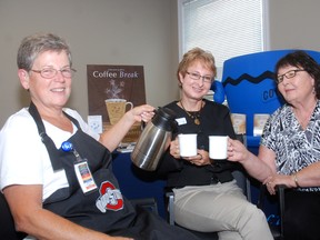 Jane Anton, left a volunteer in West Elgin for the Alzheimer Society of Elgin-St. Thomas, pours coffee for Laura Ladouceur, first link coordinator for western Elgin for the sociiety and Marion Redinger, whose husband had dementia. The trio were part of a kickoff for the Alzheimer Society's Coffee Break fundraising lunch hosted by the West Elgin Community Health Centre Wednesday.