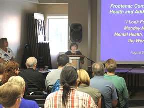 Glenda Carter of the vocational services program at Frontenac Community Mental Health and Addiction Services, unveils a video produced to reduce the stigma around people with mental health issues and encourage employers to hire them.(Michael Lea The Whig-Standard)