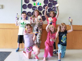 Kenneth MacRitchie, 8, Ella MacRitchie, 9, Peyj Woykin, 9, Ally-Ann Romanschuk, 8, Abby Mombourquette, 8, and Kaycie Turcotte, 9, show off their worry dolls and "I'm soda lighted you're my teacher" instructor gift at Central School at the back to school camp organized by Team For Sucess on Aug 22.
Celia Ste Croix | Whitecourt Star