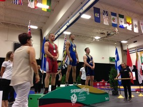 Niklas Matycio (centre), 18, won a gold medal in his weight class for wrestling at the Canada Summer Games in Sherbrooke, Que. on Aug. 8. Matycio is originally from Whitecourt but lives in Edmonton where he works and trains for wrestling.
Submitted