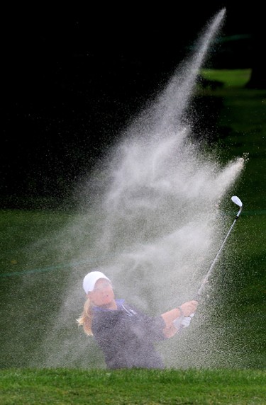 Caroline Hedwall makes a first hole bunker shot, during the final round of the LPGA 2013 CN Canadian Women's Open, at the Royal Mayfair Golf Club in Edmonton, Alta., Sunday Aug. 25, 2013. David Bloom/Edmonton Sun/QMI Agency