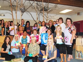 The Pat Hardy staff show off some of the art work they made during a team building exercise at the school on Wednesday, Aug. 28.
Barry Kerton | Whitecourt Star