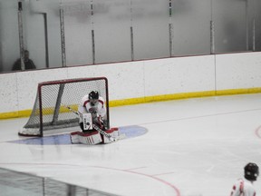 Whitecourt Wolverine goaltender Josh Bykowski, makes a blocker save in an exhibition game against the Spruce Grove Saints on Friday, Aug. 30. The Wolverines lost the game by a score of 4 to 3 in overtime.
Barry Kerton | Whitecourt Star