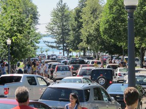 Lower Albert Street became a one-way street Sunday as parents and their children arrived at Queen’s University campus for move-in day. (PETER HENDRA The Whig-Standard)