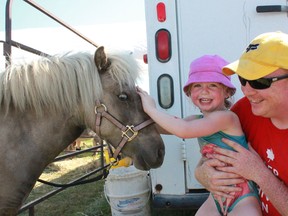 Devan Hill, pictured here on Canada Day with his daughter, Leslie, died suddenly after moving back to Nova Scotia after living eight years in Whitecourt. The Whitecourt community has responded by donating to a fund for Hill’s family.
Celia Ste Croix | Whitecourt Star