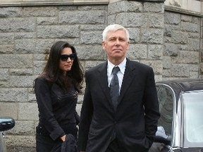 Adam Clayton with Mariana Teixeira. (WENN.COM file photo)