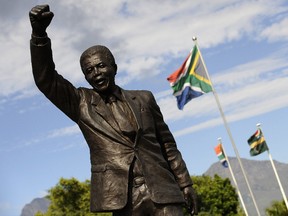 A statue of Nelson Mandela stands outside the prison where he was incarcerated for 27 years.