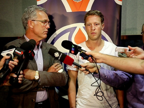 Edmonton Oilers GM Craig MacTavish (left) and Ales Hemsky at a Wednesday, Sept. 4, 2013, news conference where MacT announced Hemsky will start the 2013 season with the Oilers. (Edmonton Sun)
