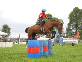 Drogheda Manor rider Rachel McWhirter jumps Doc at Upper Canada Village during the Horse Lovers Weekend.

Staff photo/GREG PEERENBOOM