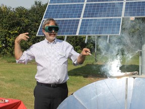 Lakeland College environmental sciences instructor Rob Baron, demonstrates how it is possible to cook a hot dog using solar energy as part of the open house hosted at the college’s Centre for Sustainable Innovation (CSI) Thursday afternoon.