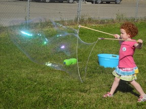 This young lady who was involved in the local summer play mob was getting creative with her bubble making skills during one of the group’s outdoor activities. The idea proved to be such a hit that it has already been scheduled in for next summer, giving kids and parents something to look forward to. - Caitlin Kehoe, Reporter/Examiner