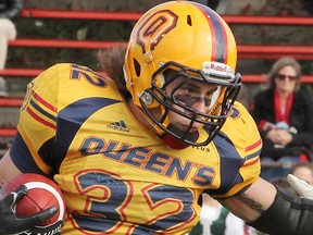 Queen's Golden Gaels running back Ryan Granberg and teammates need to to get the ground game going against the Windsor Lancers Saturday at Richardson Stadium. 
Whig-Standard File