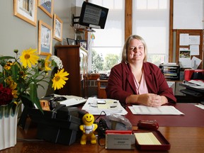 Janice Drake is the first ever graduate from Sir James Whitney School for the Deaf in Belleville to become the school's principal. She is seen here in her office Friday.