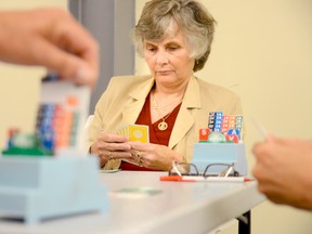 Debbie Bennett, who once represented the Canadian Bridge Federation at a tournament in France, is shown here at the Belleville Duplicate Bridge Club.