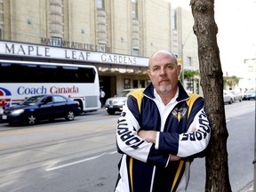 Allan Donnan, a survivor of sexual abuse at Maple Leaf Gardens decades ago, stands in front of the historic building Friday, September 6, 2013. Donnan is owner of a Junior A hockey team, the Predators, who will play at the converted arena now owned by Ryerson University. (Michael Peake/Toronto Sun)