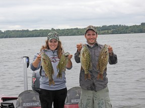 Ashley Rae and Eric Riley holding four of their five-fish limit caught in a Bass Anglers Association (BAA) tournament on Muskrat Lake in Cobden last weekend.