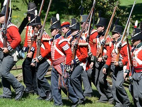 Backus Conservation Area's annual War of 1812 Re-enactment on the weekend featured two afternoon battles, a twilight battle, re-enactor games and competitions, flint-and-steel fire starting demonstrations, candle dipping and period music, various sutlers, artillery demonstrations, and more. CHRIS ABBOTT/TILLSONBURG NEWS