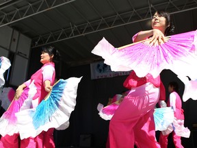 The Kingston Chinese Folk Dance Troupe performs at Sunday’s Kingston Multicultural Arts Festival in Confederation Park. (Elliot Ferguson/The Whig-Standard)