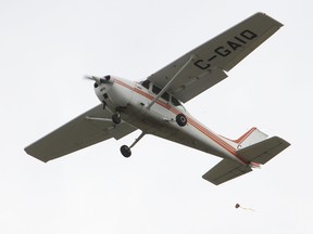 A bag of flour drops from a Kingston Flying Club plane during Saturday’s provincial flour bombing competition at the Kingston airport. (Elliot Ferguson/The Whig-Standard)